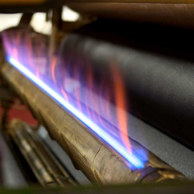 flames in a footwear manufacturing machine